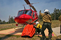 Putting out fires by helicopter - Rent helicopter firefighting by heavy helicopter - HM Solution Bell 212 and crew
